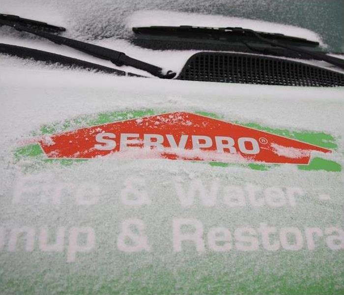 Image of snowy SERVPRO vehicle